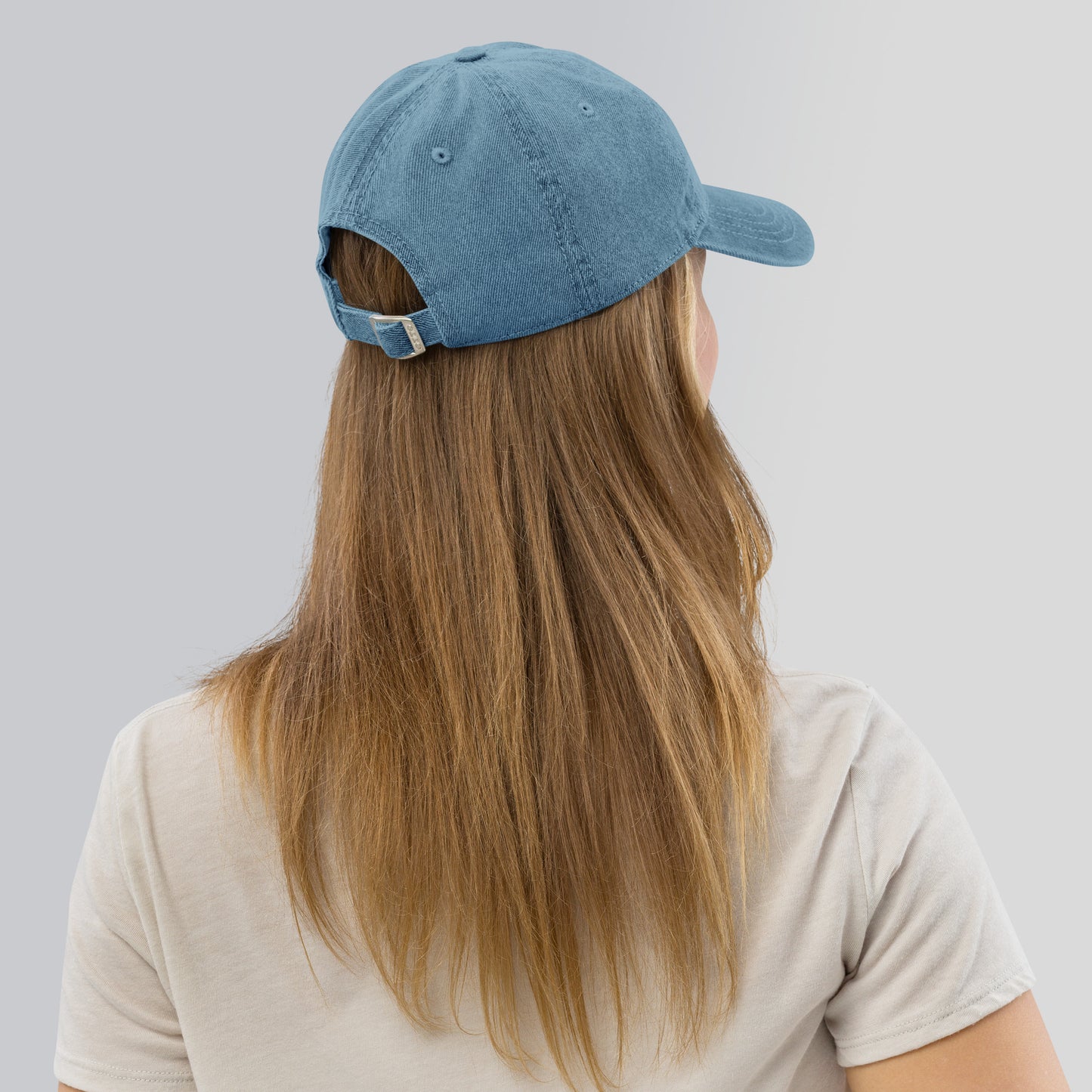 Capri denim cap with bold yellow lettering