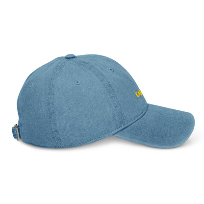 Capri denim cap with bold yellow lettering