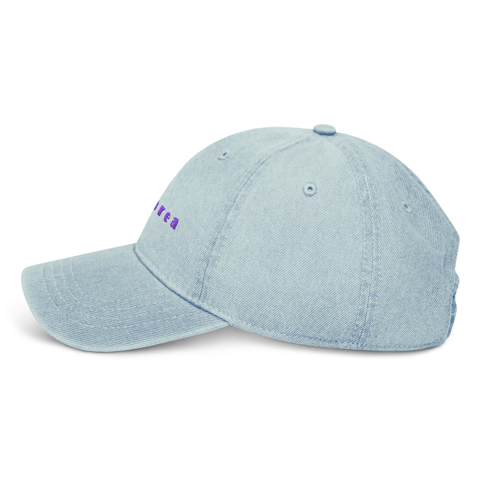 Panarea light denim cap with bold purple text