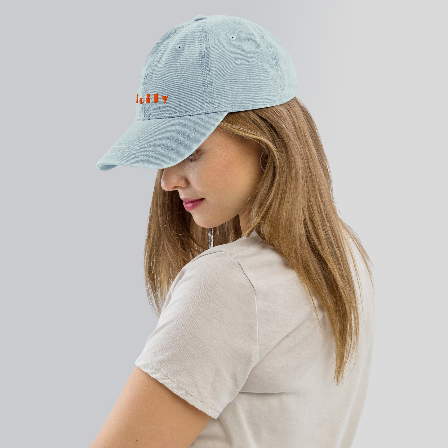 Sicily light denim cap with bold orange lettering